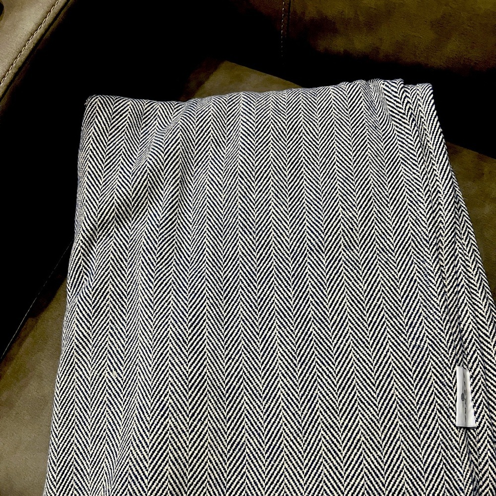 Amex sferra throw blanket  navy blue and white herringbone weave.